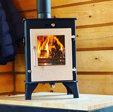 Tiny Wood Stove: The Petersons, Airstream Life to a Self-made Tiny Home ...