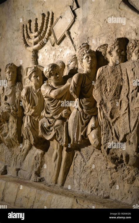 Wall relief on arch of titus depicting Menorah taken from temple in ...