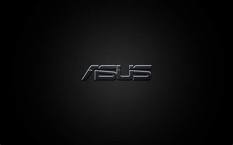 the asus logo is shown in black and silver on a dark background with ...