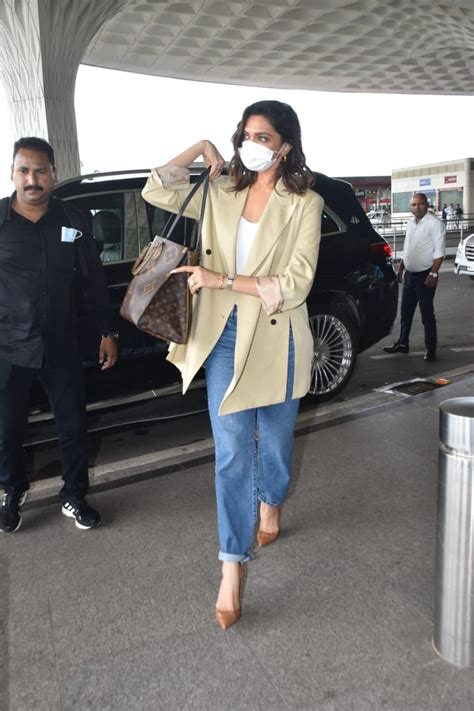 Deepika Padukone flaunts casual style in coat and denim jeans at Mumbai ...