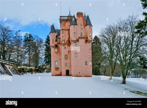 CRAIGIEVAR CASTLE ABERDEENSHIRE SCOTLAND WITH THE PINK TOWER SURROUNDED ...