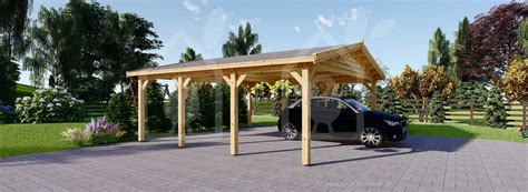 a car is parked under a wooden shelter