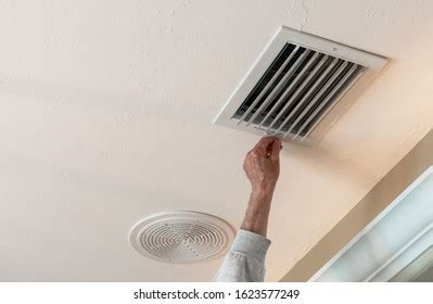 Handyman Adjusting Hvac Ceiling Air Vent Stock Photo 1623577249 ...