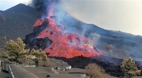 Thousands locked down as La Palma volcano destroys cement works