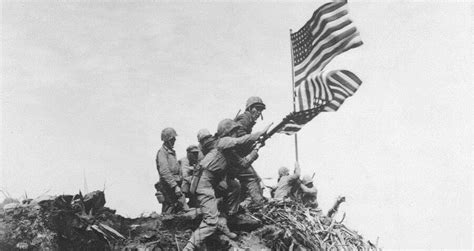 Raising The Flag On Iwo Jima: The Story Behind WW2's Most Iconic Photo