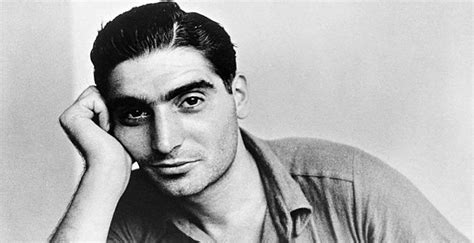 Robert Capa Biography - Childhood, Life Achievements & Timeline