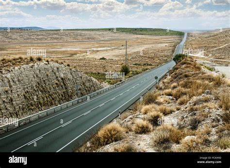 Asphalt road and white line marking Stock Photo - Alamy