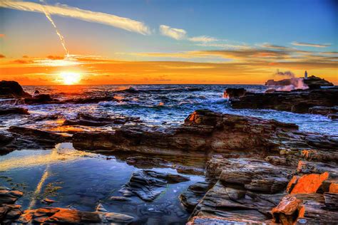 Godrevy Lighthouse, Golden Cornwall Sunset Photograph by Paul Thompson ...