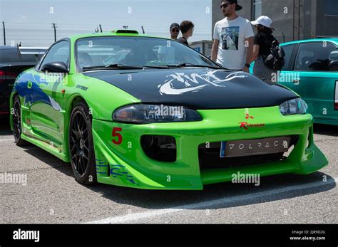 A second-generation green Mitsubishi Eclipse, tuned in style of Brian O ...