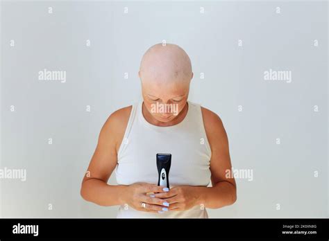 consequences of chemotherapy. Shaving off the last hair on the head ...