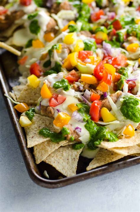 Easy Vegetarian Nachos Recipe with Creamy Cheese Sauce | Umami Girl