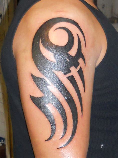 50 Tribal Tattoos For Men - InspirationSeek.com