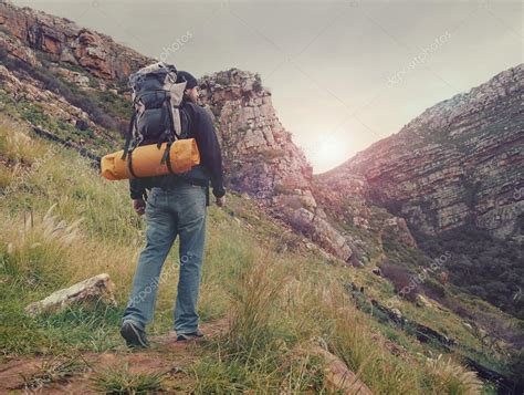 man hiking wilderness mountain with backpack — Stock Photo © Daxiao ...