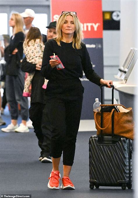 Cameron Diaz, husband Benji Madden and daughter arrive at JFK - thejjReport