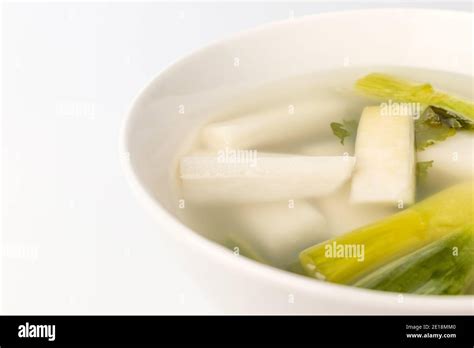 Clear soup kimchi on white background Stock Photo - Alamy