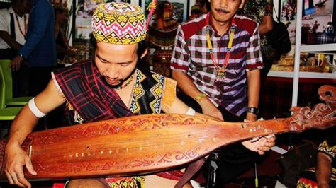 The Sape guitar-a traditional musical instrument of Dayak People