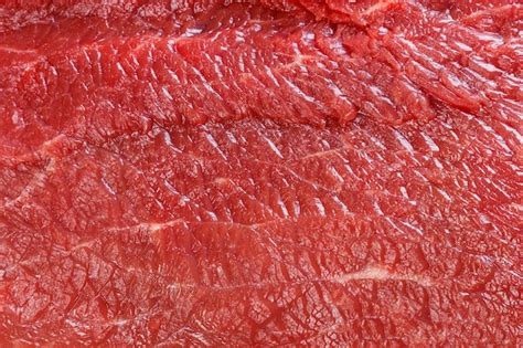 Premium Photo | Raw red beef meat macro texture background