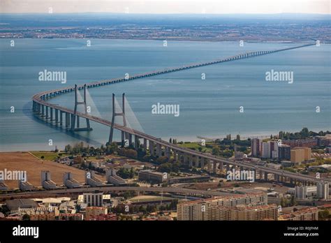 Aerial view of the Vasco da Gama bridge over the Tagus river in Lisbon ...