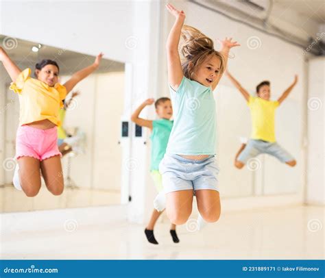 Kids Jumping in Dance Studio Stock Image - Image of group, children ...