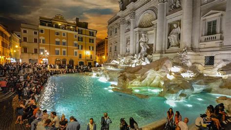 Visit the Trevi Fountain at the Piazza di Trevi (Rome)