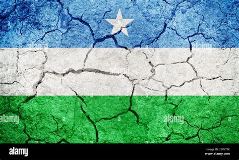 Puntland State of Somalia flag, region in northeastern Somalia, on dry ...