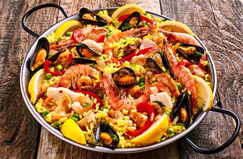 Hats Off to Paella, the Epitome of Spanish Cuisine - Can’t wait to get ...