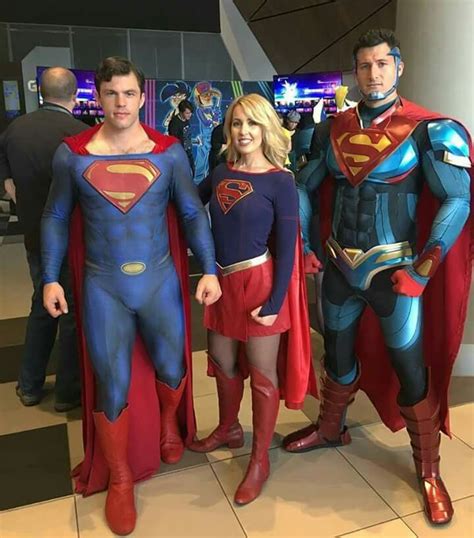 two men and a woman dressed up as superman and supergirl standing next ...