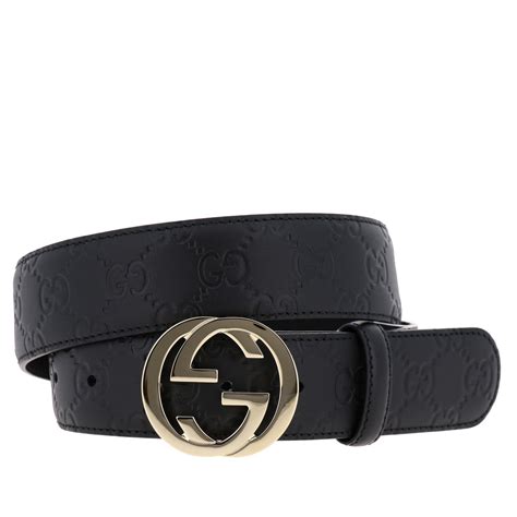 GUCCI: leather belt with GG buckle and all over embossed logo - Black ...