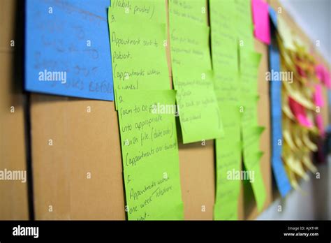 Post it notes on a wall Stock Photo - Alamy