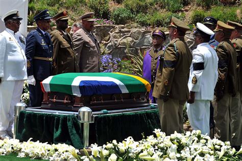 Nelson Mandela buried in tiny home village