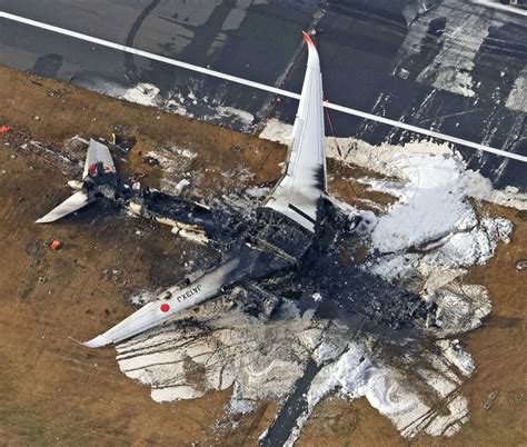 Runway warning lights were broken at time of Japan Airlines plane fire ...