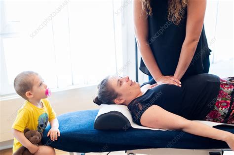 Osteopathy treatment - Stock Image - C045/8665 - Science Photo Library