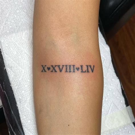 Forearm Roman Numeral Tattoo Creation | Roman numeral tattoos, Roman ...