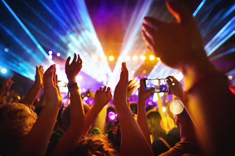 Cheering Crowd At A Concert Stock Photo - Download Image Now - iStock