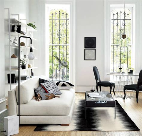 For-an-elegant-living-room-we-choose-a-black-and-white-rug For-an ...