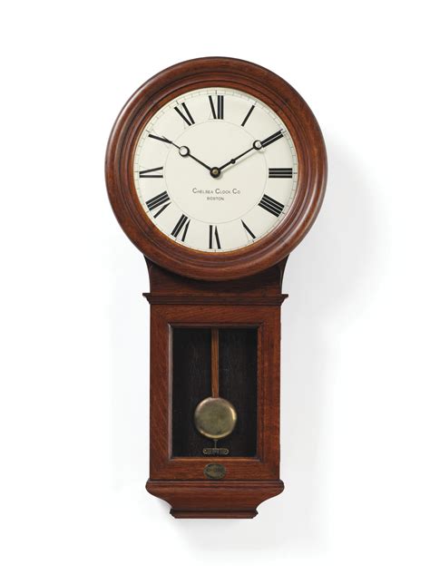 A pendulum wall clock in a mahogany case , CHELSEA CLOCK COMPANY; CIRCA ...