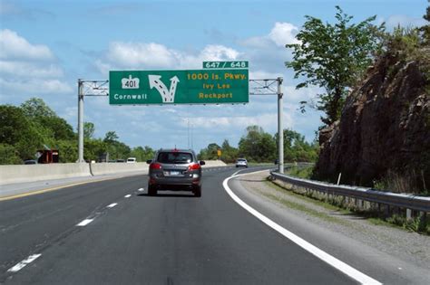 Hwy 401 - 1000 Is. Parkway exit signs - why are they green with yellow ...