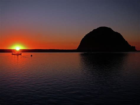 Sunset behind Morro Rock Photograph by Dave Sribnik - Fine Art America