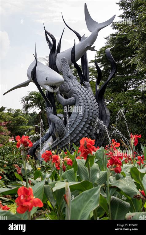 Statue of shark and a crocodile representing Sura and Baya after which ...