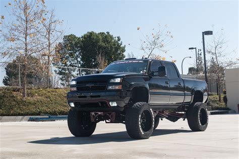 King Lift on Custom Black Chevy Silverado Custom Truck Parts, Custom ...