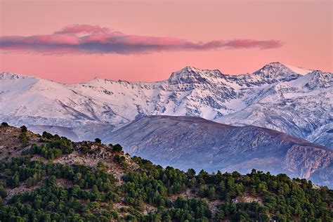 Sierra Nevada National park at pink sunset. Winter time. Spain ...