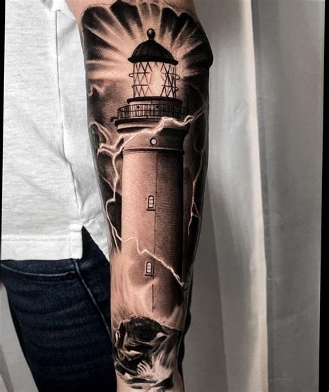 20+ Stunning Lighthouse Tattoo Designs - The XO Factor