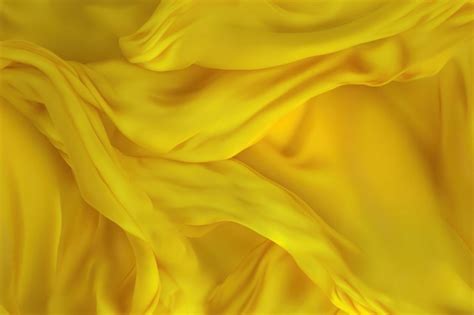 Premium Photo | Yellow fabric texture with doubles occupying the entire ...