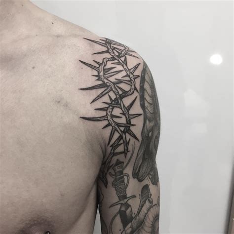 Crown of thorns tattoo on the shoulder - Tattoogrid.net