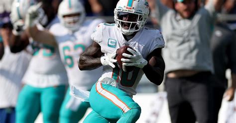 Tyreek Hill's backflip celebration, explained: Dolphins WR uses phone ...