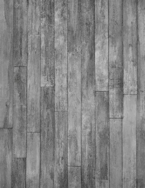 a black and white photo of an old wood paneled wall that has been ...