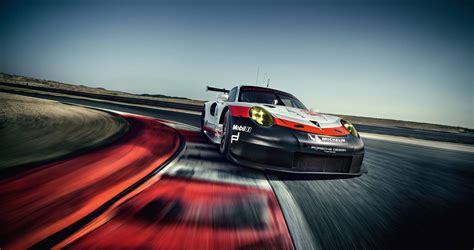 Download Auto Racing Car At Super Speed Wallpaper | Wallpapers.com