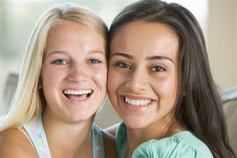 Two Teenage Girls Smiling stock photo. Image of teenagers - 6882904