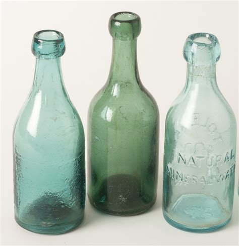 Four Antique Soda Bottles | Witherell's Auction House