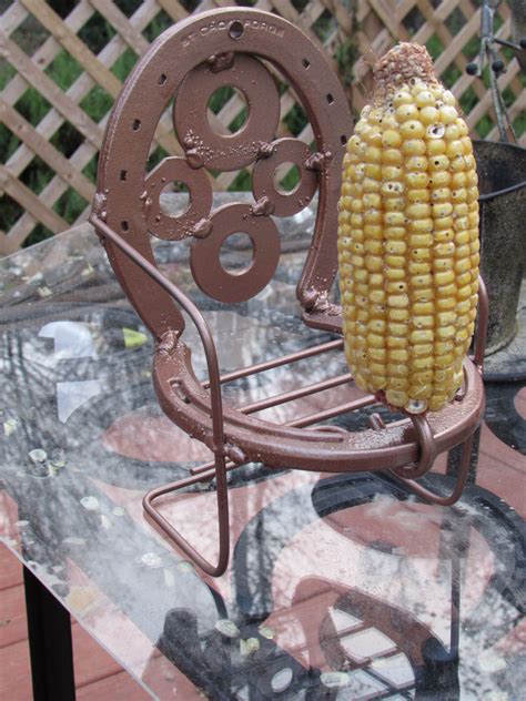 Squirrel feeder chair Horseshoe Crafts, Horseshoe Art, Welding Crafts ...